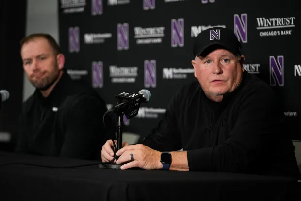 Northwestern’s new offensive coordinator Chip Kelly, right, speaks as head coach David Braun listens during an NCAA college football press conference, Wednesday, Feb. 4, 2026, in Evanston, Ill. (AP Photo/Erin Hooley)