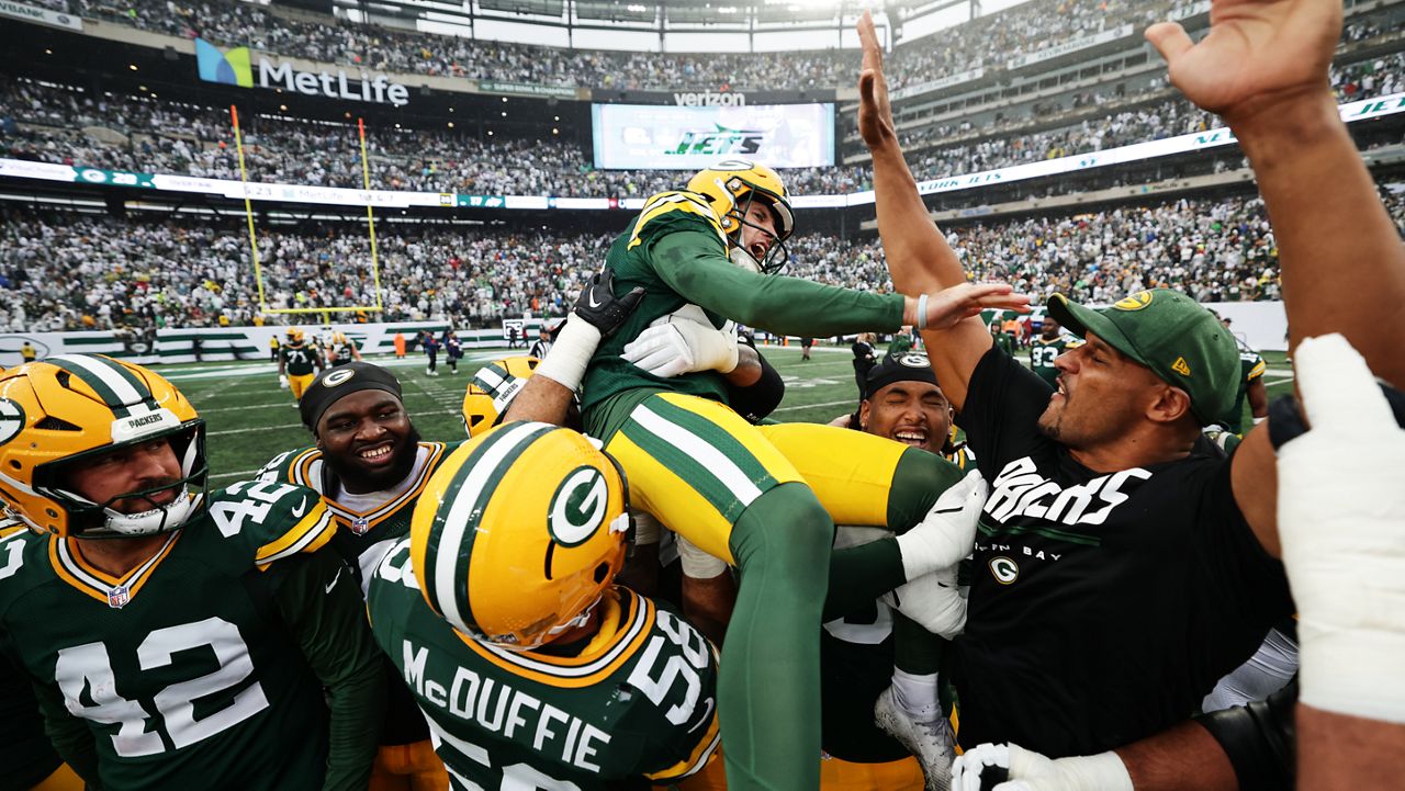 Green Bay Packers kicker Trey Smack (28) is lifted in celebration by his teammates after kicking the game-winning field goal during an NFL football game against the New York Jets in East Rutherford, N.J., Sunday, Sept. 20, 2026.