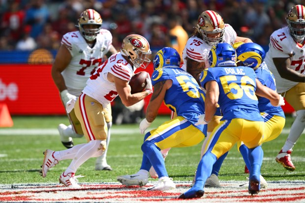 MELBOURNE, AUSTRALIA - SEPTEMBER 11: Christian McCaffrey #23 of the San Francisco 49ers runs the ball in the second quarter of the NFL football game against Los Angeles Rams at the Melbourne Cricket Ground on September 11, 2026 in Melbourne, Australia. (Photo by Quinn Rooney/Getty Images)