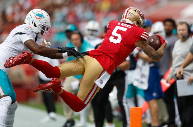 San Francisco 49ers' Mike Evans (5) dives for a first down against the Miami Dolphins in the first quarter at Levi's Stadium in Santa Clara, Calif., on Sunday, Sept. 20, 2026. (Nhat V. Meyer/Bay Area News Group)