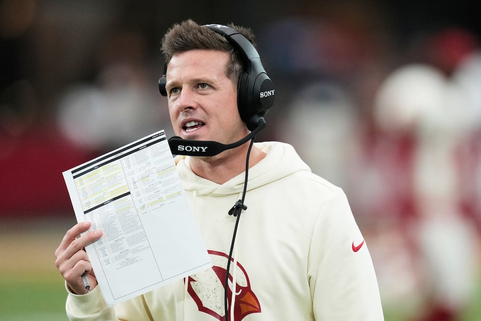 Arizona Cardinals head coach Mike LaFleur talks into his headset during the second half of an...