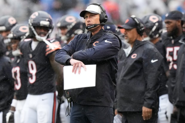 Chicago Bears head coach Ben Johnson looks at the score board during the second half of an NFL football game against the Minnesota Vikings in Chicago, Sunday, Sept. 20, 2026. (AP Photo/Nam Y. Huh)