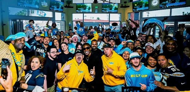 Members of the Die Hard Bolt Club pack Dirty Birds on Ocean Beach to watch this spring's NFL Draft. (Courtesy of Matthew Guccione)