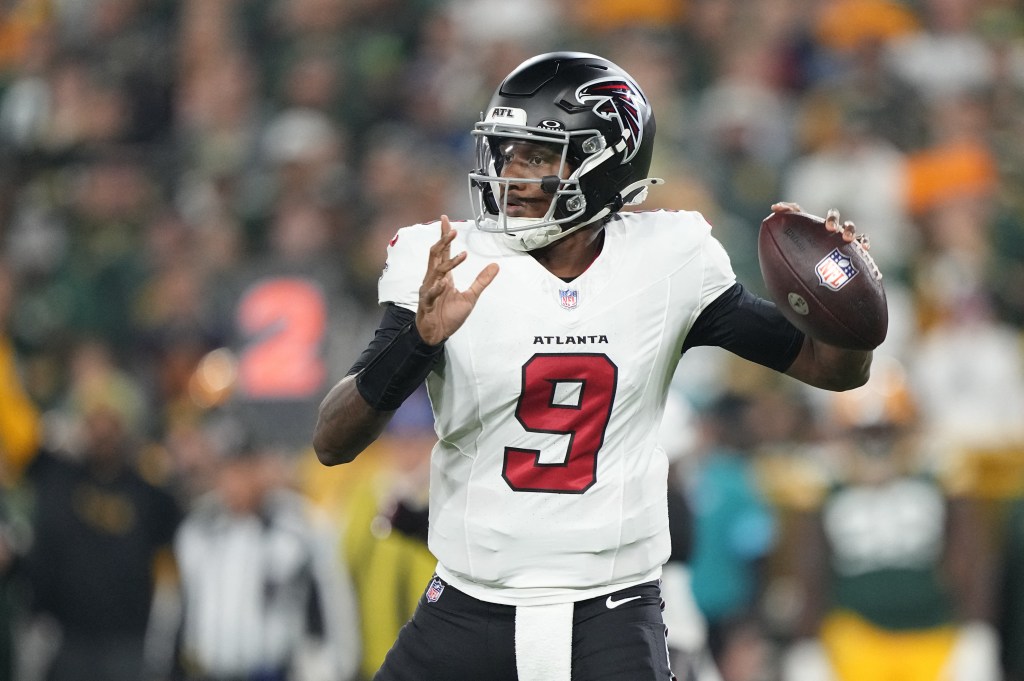 Atlanta Falcons quarterback Michael Penix Jr. (9) looking to pass the ball.