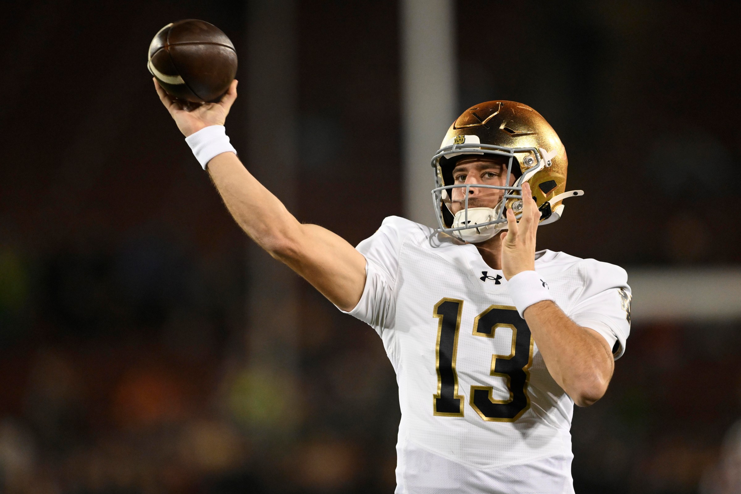STANFORD, CALIFORNIA - NOVEMBER 29: CJ Carr #13 of the Notre Dame Fighting Irish warms up before the game against the Stanford Cardinal at Stanford Stadium on November 29, 2025 in Stanford, California. (Photo by Eakin Howard/Getty Images)