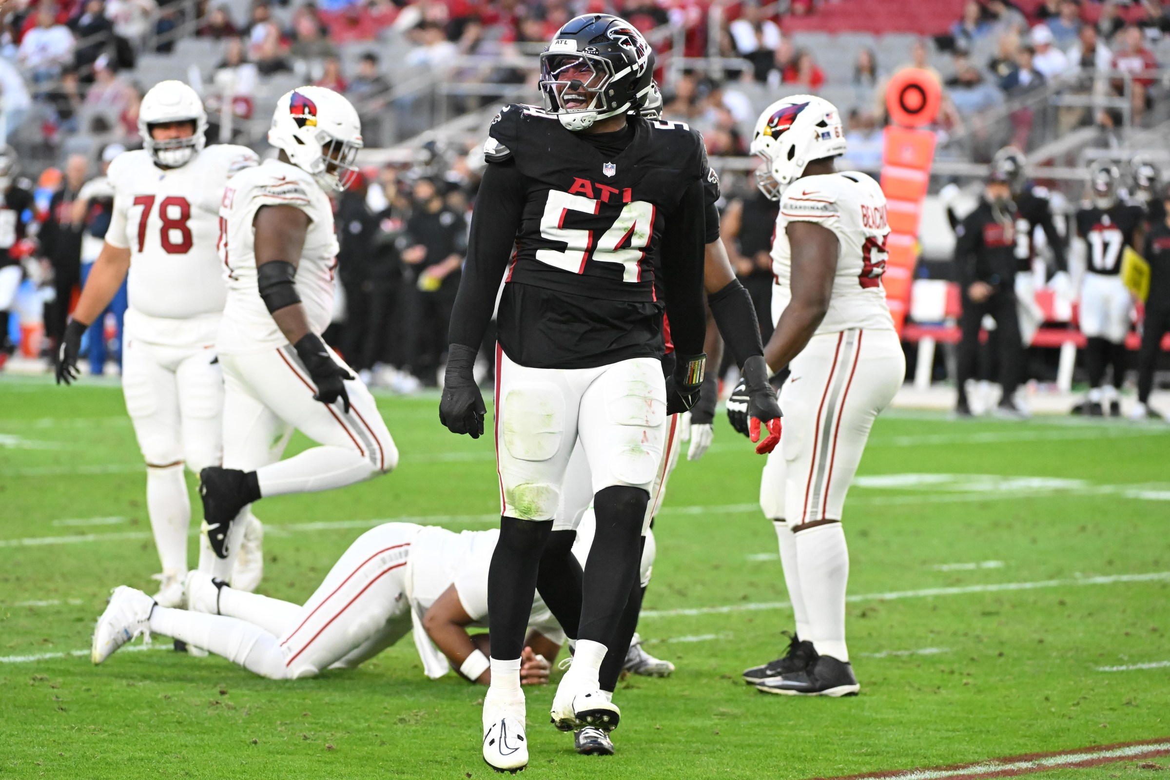 GLENDALE, ARIZONA - DECEMBER 21: Brandon Dorlus #54 of the Atlanta Falcons celebrates a sack during the fourth quarter against the Arizona Cardinals at State Farm Stadium on December 21, 2025 in Glendale, Arizona. (Photo by Norm Hall/Getty Images)