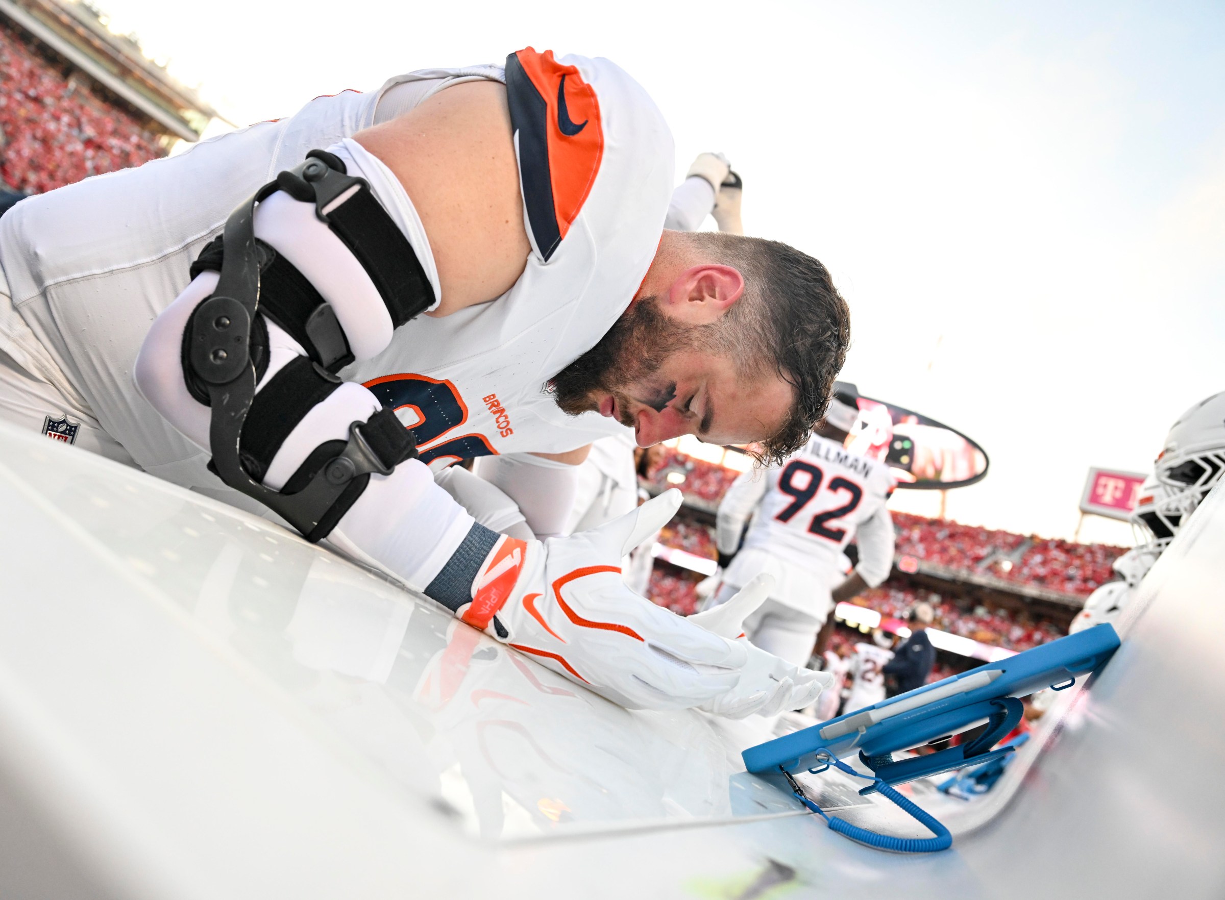 KANSAS CITY , MO - SEPTEMBER 14: Zach Allen (99) of the Denver Broncos takes a personal moment during the first quarter against the Kansas City Chiefs at Arrowhead Stadium in Kansas City, Missouri on Monday, September 14, 2026. (Photo by AAron Ontiveroz/The Denver Post)