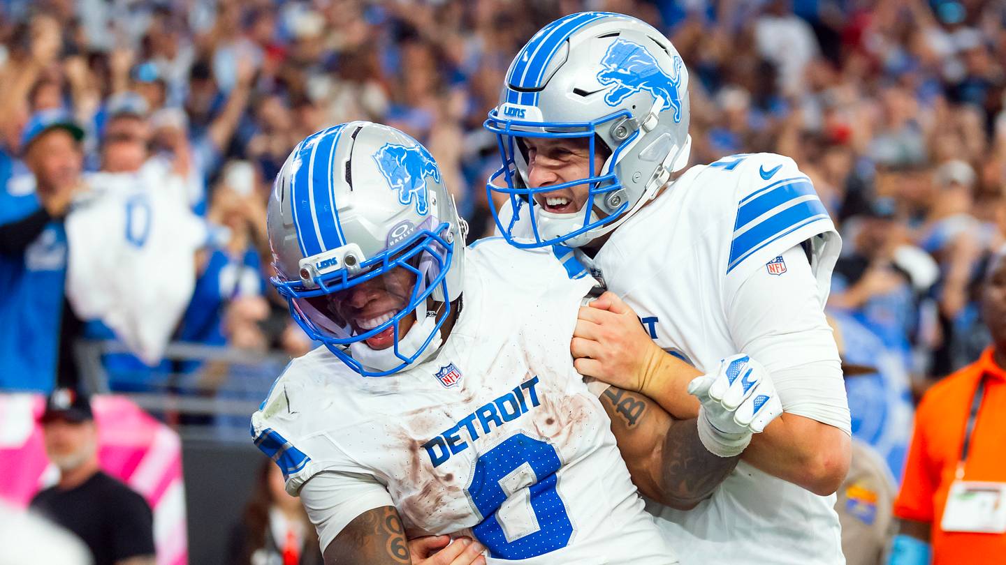 Oct 11, 2026; Glendale, Arizona, USA;  Detroit Lions running back Jahmyr Gibbs (0) celebrates a touchdown with quarterback Jared Goff (16) against the Arizona Cardinals at State Farm Stadium.  Mandatory Credit: Mark J. Rebilas-Imagn Images
