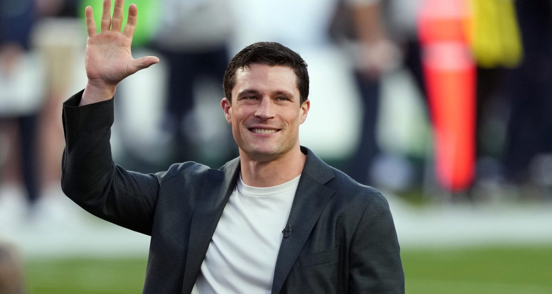 Feb 8, 2026; Santa Clara, CA, USA; Carolina Panthers former player Luke Kuechly stands on the field before the start of the second quarter in Super Bowl LX between the New England Patriots and the Seattle Seahawks at Levi's Stadium.