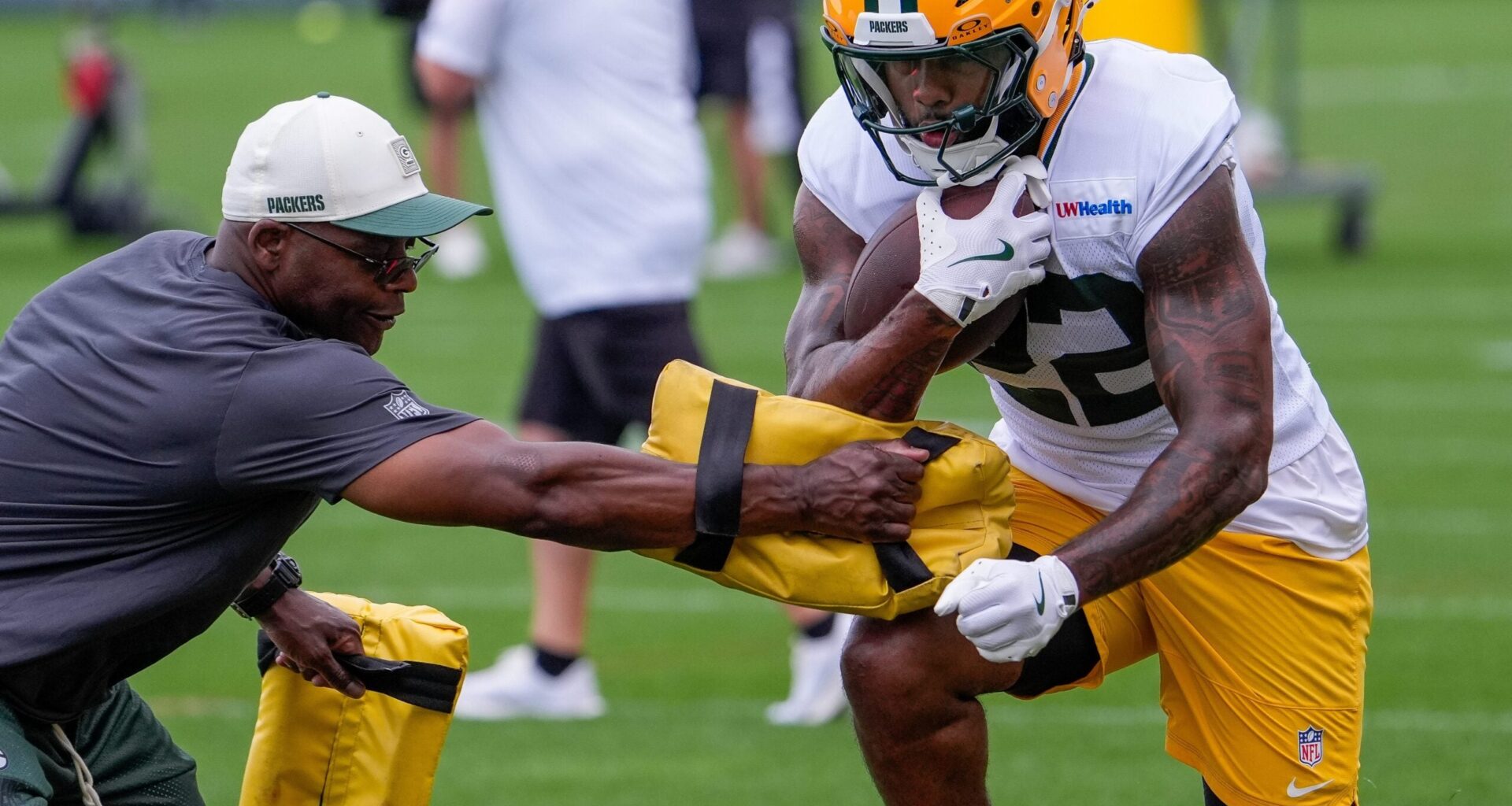 Green Bay Packers running back Pierre Strong Jr. (22) runs through a drill during practice on Friday, July 31, 2026, at Ray Nitschke Field in Ashwaubenon, Wisconsin.