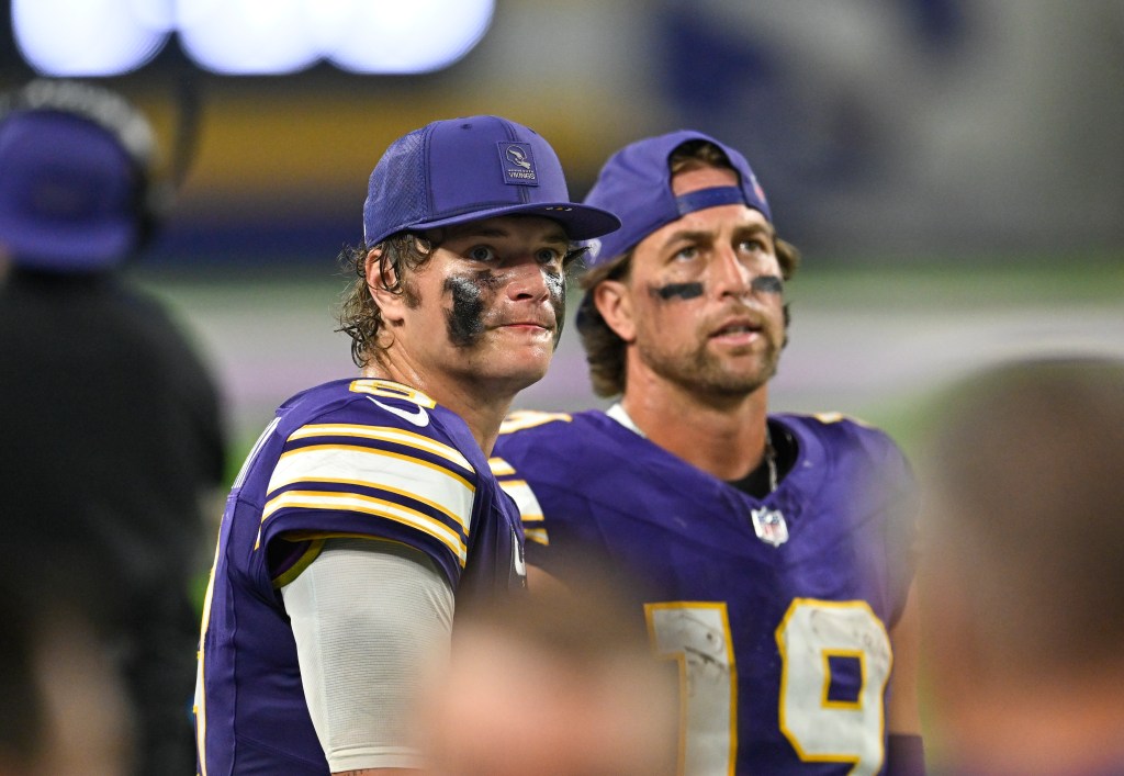 Minnesota Vikings players on the field during a game against the Atlanta Falcons.