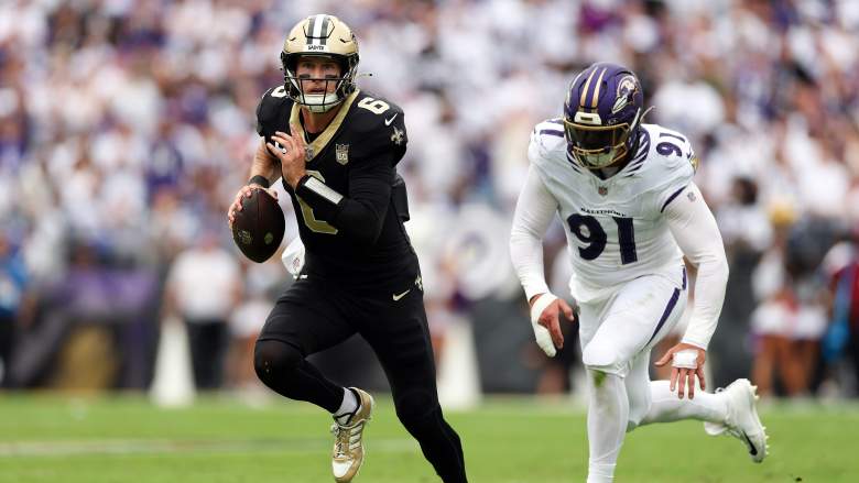 Baltimore Ravens defensive end Trey Hendrickson pursues Saints quarterback Tyler Shough