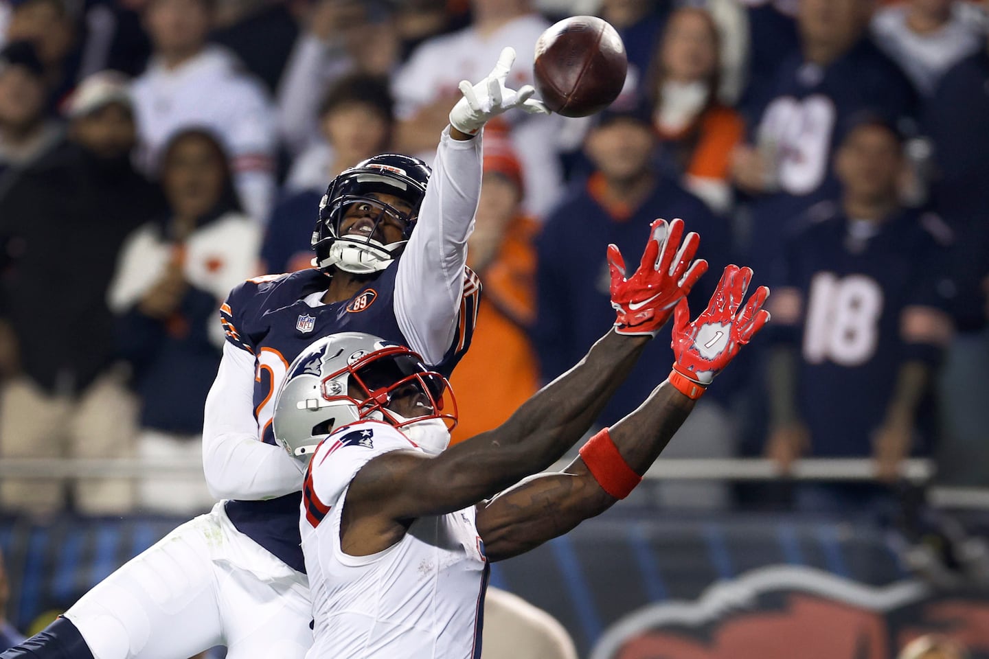 Bears cornerback Tyrique Stevenson tips a pass away from Patriots wide receiver A.J. Brown in the fourth quarter. 