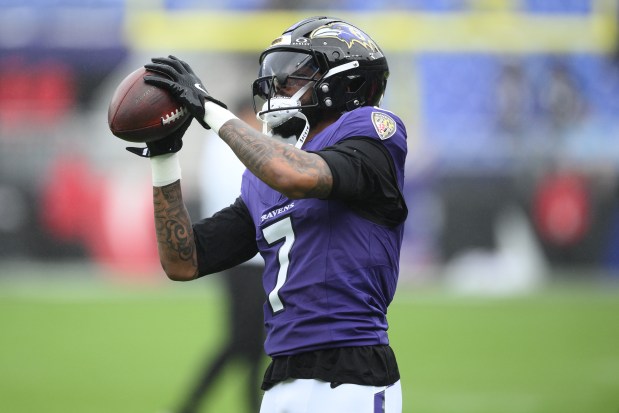 Baltimore Ravens wide receiver Rashod Bateman (7) works out before an NFL football game against the Tennessee Titans, Sunday, Oct. 4, 2026 in Baltimore. (AP Photo/Nick Wass)