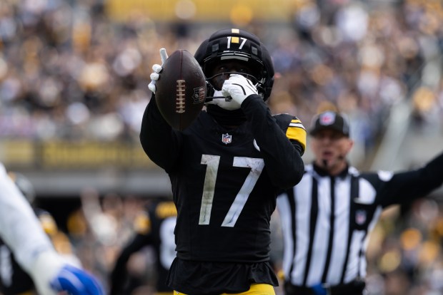 Pittsburgh Steelers wide receiver Germie Bernard (17) signals for a first down during an NFL football game in Pittsburgh, Sunday, Oct. 11, 2026. (AP Photo/Matt Durisko)