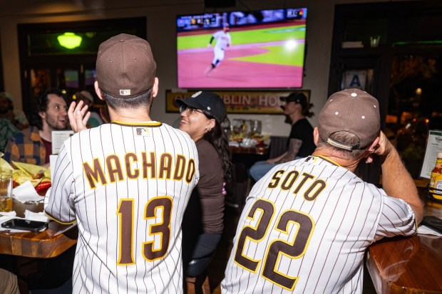 Padres fans watch the Wild Card Series from McGregor's Bar & Grill on Rancho Mission Road. (Luke Johnson / The San Diego Union-Tribune)