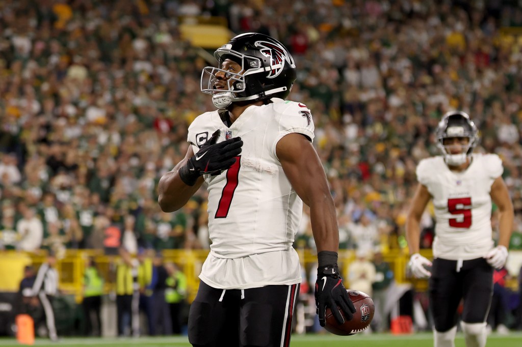 Atlanta Falcons' Bijan Robinson (7) celebrates after scoring a touchdown.