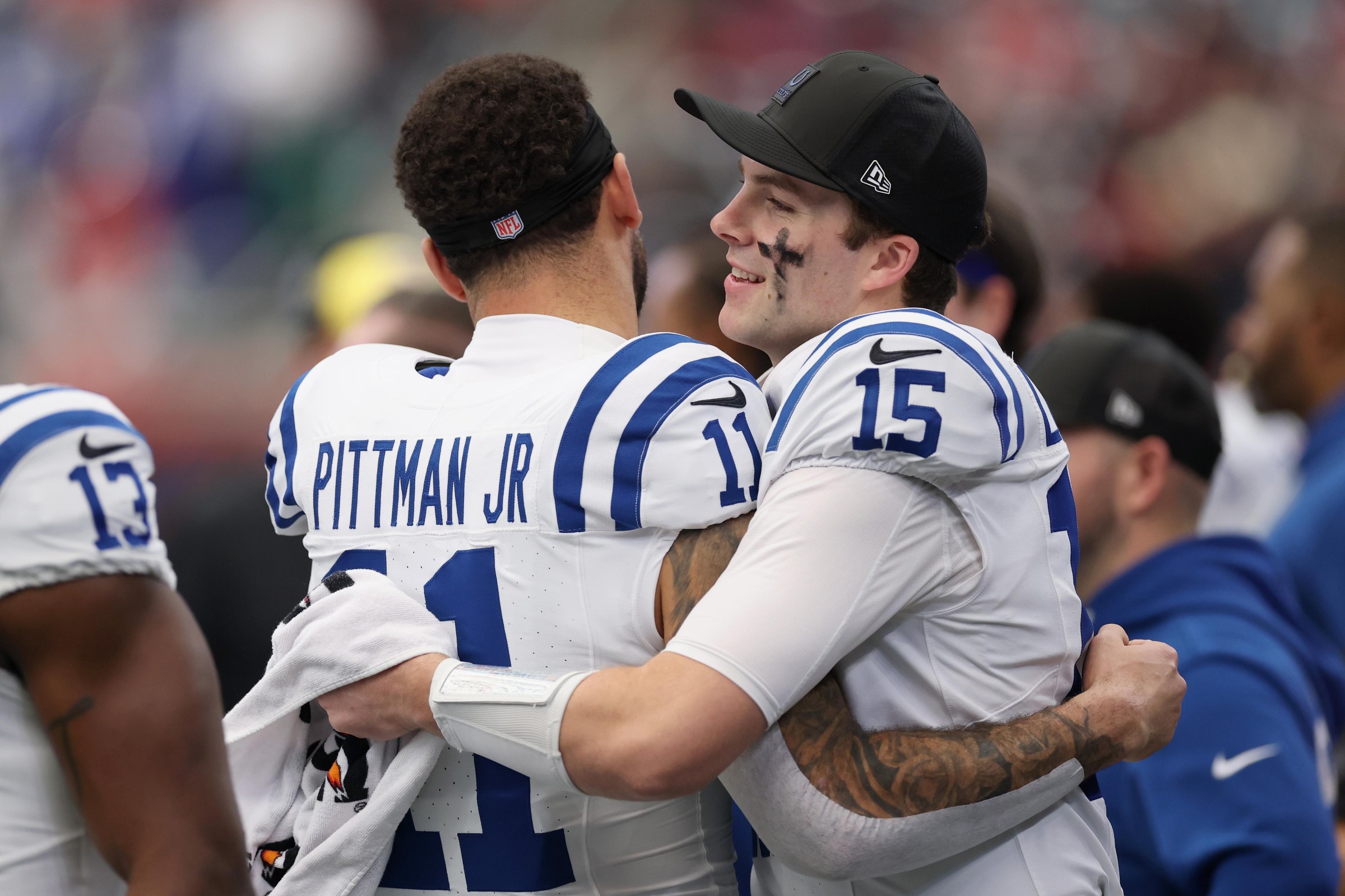 HOUSTON, TEXAS - JANUARY 04: Michael Pittman Jr. #11 and Riley Leonard #15 of the Indianapolis Colts interact prior to the game against the Houston Texans at NRG Stadium on January 04, 2026 in Houston, Texas. (Photo by Tim Warner/Getty Images)