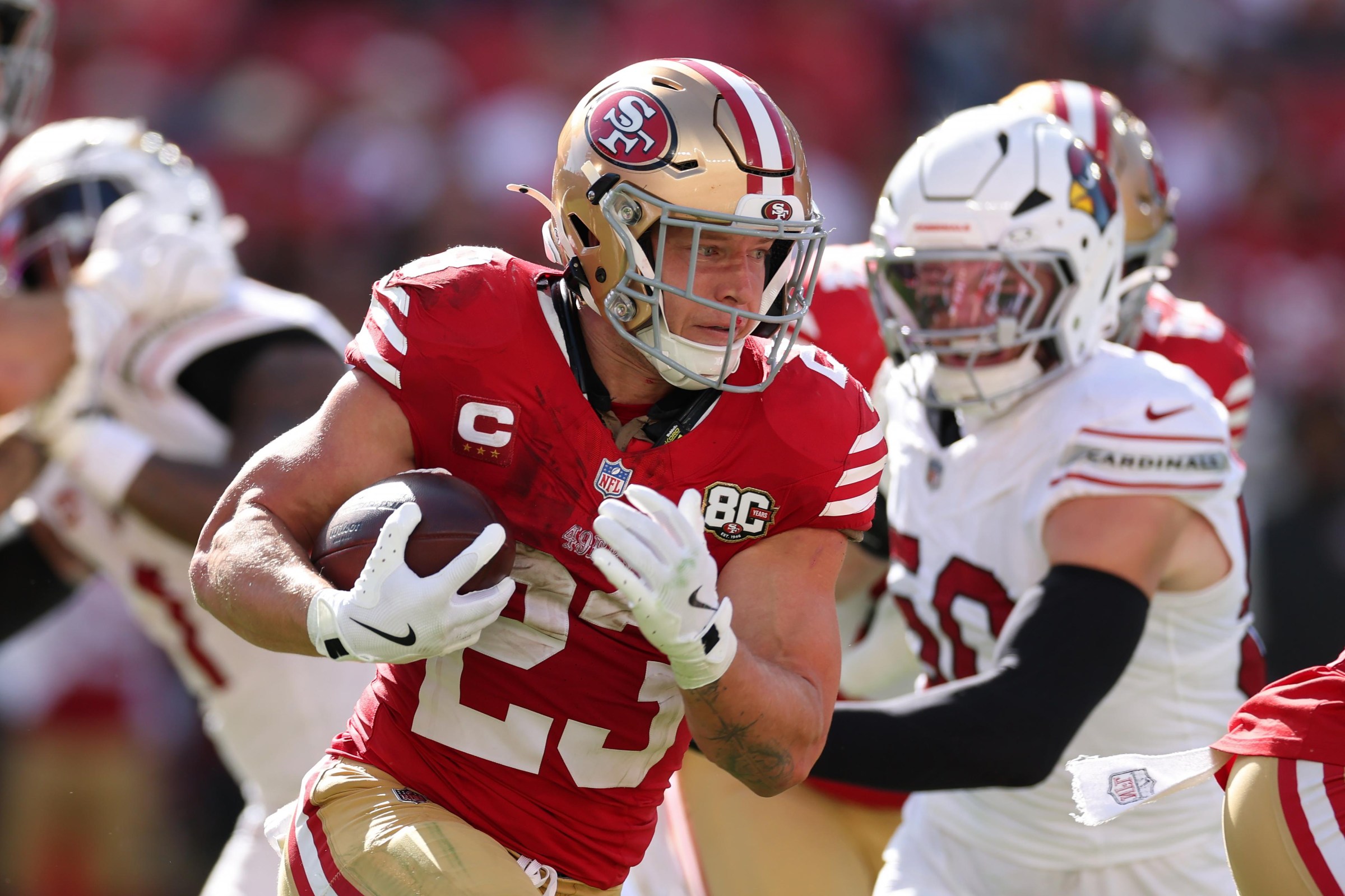 SANTA CLARA, CALIFORNIA - SEPTEMBER 27: Christian McCaffrey #23 of the San Francisco 49ers runs with the ball during the third quarter against the Arizona Cardinals at Levi’s Stadium on September 27, 2026 in Santa Clara, California. (Photo by Ezra Shaw/Getty Images)