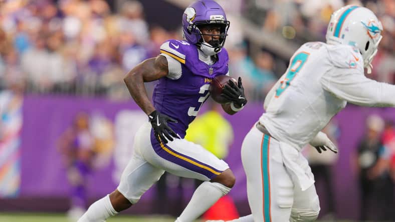Minnesota Vikings wide receiver Jordan Addison (3) rushes during a game against the Miami Dolphins at U.S. Bank Stadium