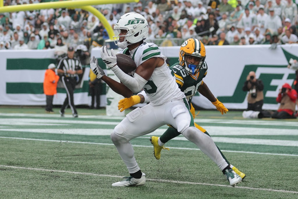 New York Jets wide receiver Adonai Mitchell catches a pass against the Green Bay Packers.