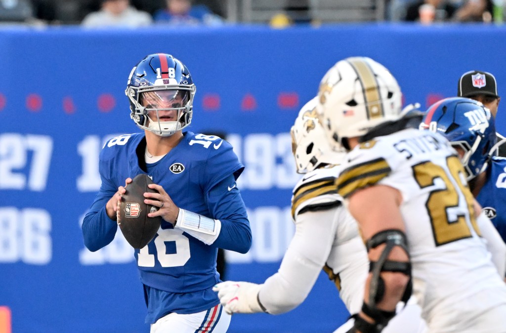 New York Giants quarterback J.J. McCarthy (18) looks for an open receiver during a game against the New Orleans Saints.