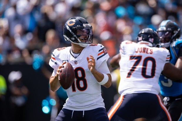 Bears quarterback Caleb Williams (18) drops back against the Carolina Panthers in the first half of Chicago's 59-37 victory Sunday, Sept. 13, 2026, in Charlotte, N.C. Williams passed for 269 yards and two touchdowns and ran for 65 yards and two TDs. (Scott Kinser / Associated Press)