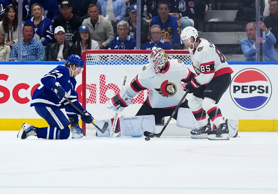 Apr 29, 2025: Bobby McMann (74) battles for the puck with Ottawa Senators defenseman Jake Sanderson (85) in the second period during game five of the first round of the 2025 Stanley Cup Playoffs. Credit: Nick Turchiaro-Imagn Images
