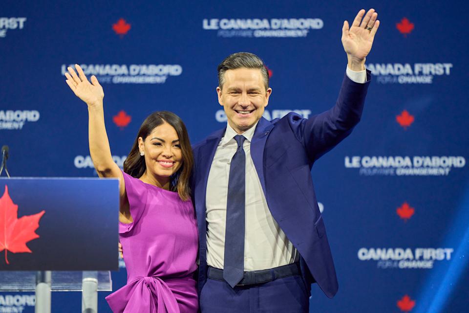 Canada's Conservative leader Pierre Poilievre (R) and his wife Anaida  wave to the crowd at the Conservative election party at the Rogers Centre in Ottawa, Ontario on April 28, 2025. Prime Minister Mark Carney won Canada's election on April 28, 2025, leading his Liberal Party to a new term in power after convincing voters his experience managing crises had prepared him to confront US President Donald Trump. (Photo by Geoff Robins / AFP) (Photo by GEOFF ROBINS/AFP via Getty Images)          
