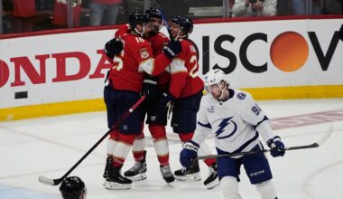 Florida Panthers defenseman Aaron Ekblad, top center, celebrates after his goal during the third period in Game 4 of an NHL hockey Stanley Cup first-round playoff series against the Tampa Bay Lightning, Monday, April 28, 2025, in Sunrise, Fla. (AP Photo/Marta Lavandier)