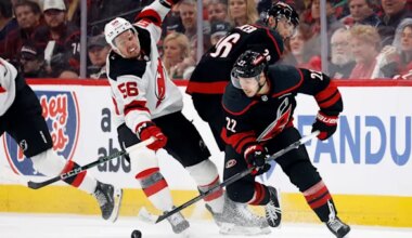 Hurricanes advance to 2nd round of NHL playoffs, beating Devils 5-4 in double OT
