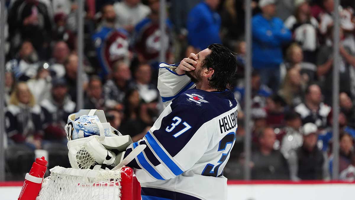 Winnipeg Jets goaltender Connor Hellebuyck (37) reacts following a goal scored by the Colorado Avalanche in the second period in game four of the first round of the 2024 Stanley Cup Playoffs at Ball Arena.