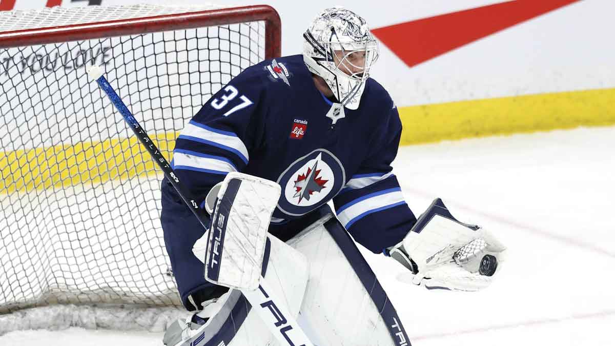Winnipeg Jets goaltender Connor Hellebuyck (37) warms up before a game against the St. Louis Blues at Canada Life Centre.