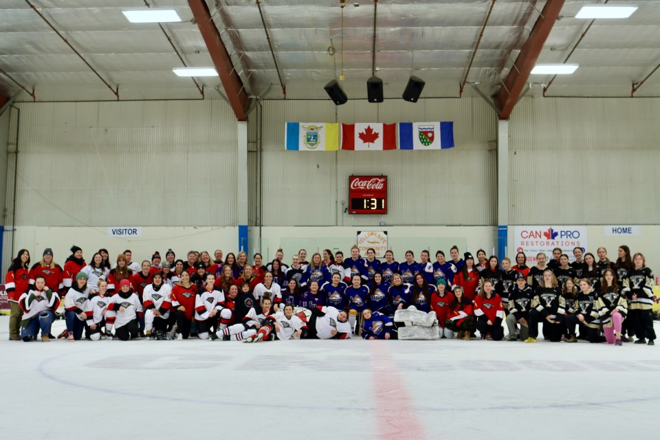 Players in the inaugural Yellowknife Robins Women's Hockey Tournament in 2025. Ehxea Antoine/Cabin Radio