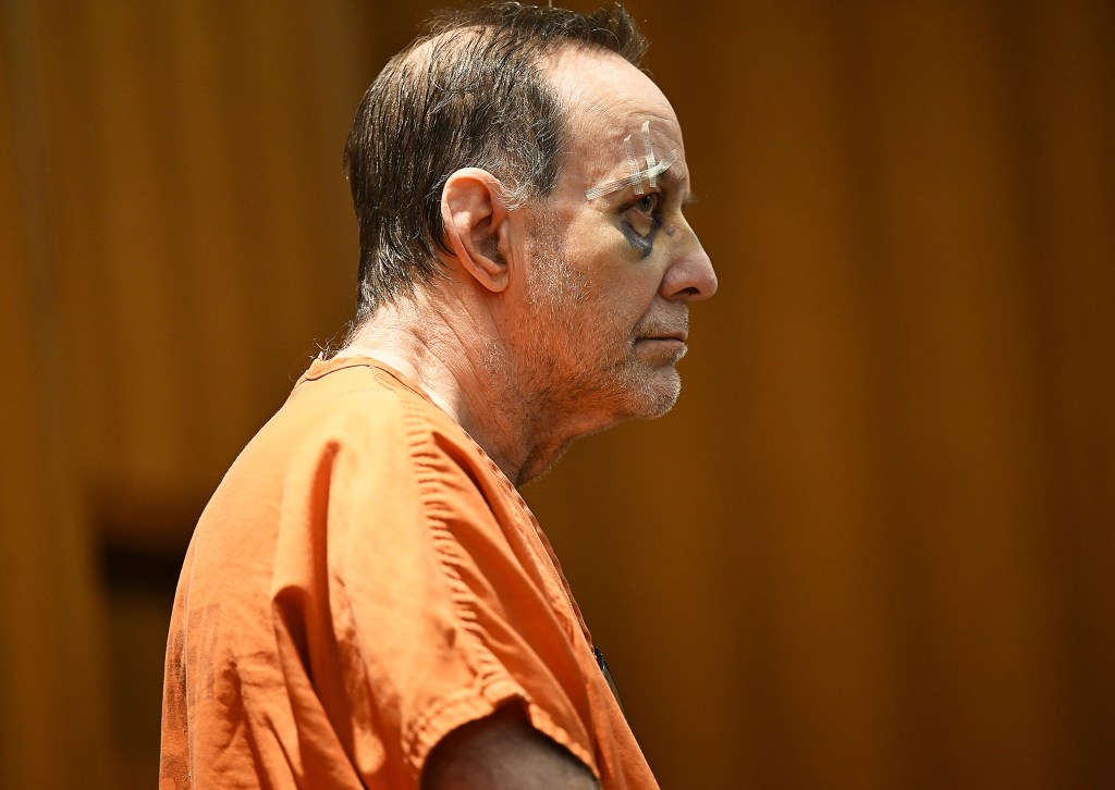 Defendant Zvi Levran, 68, in an orange shirt, attentively listening during his court hearing at Oakland County Circuit Court, Pontiac, Michigan, 2025