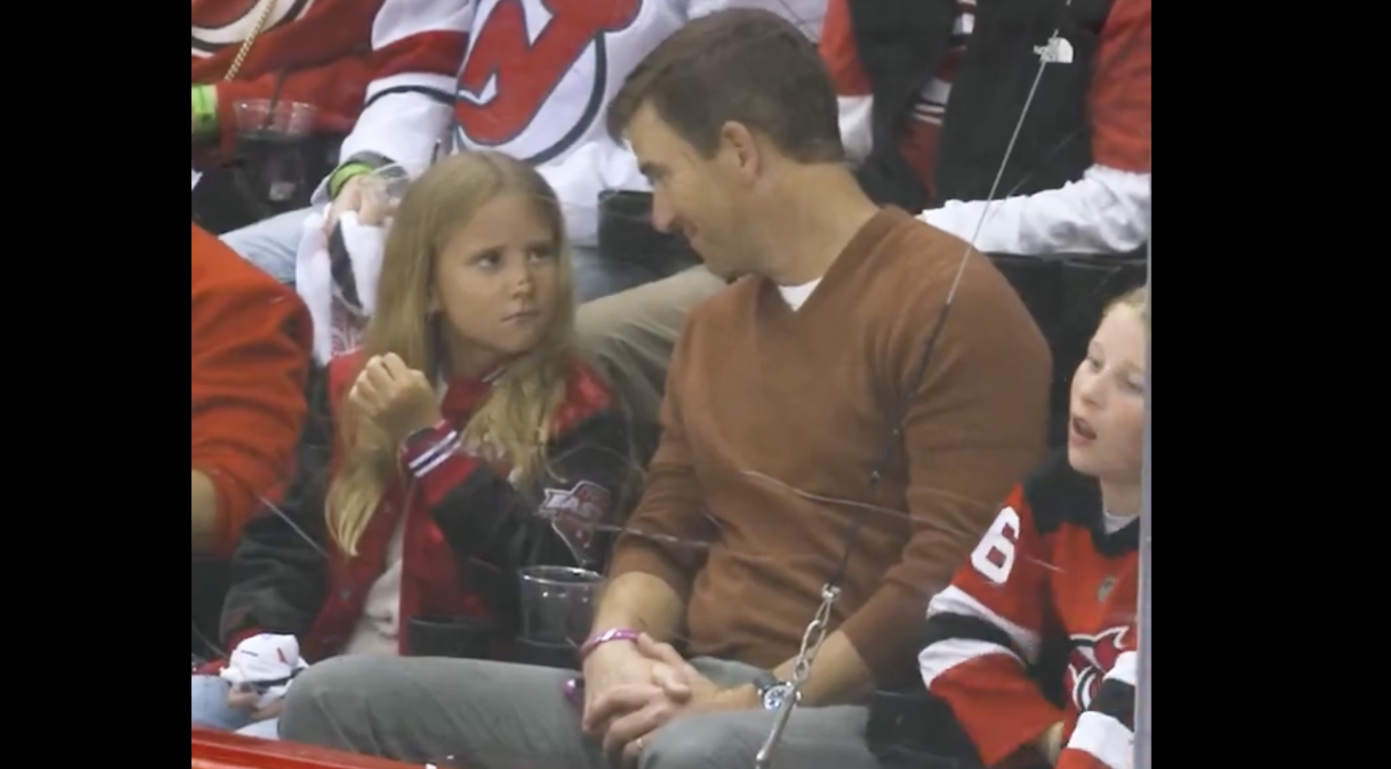 Eli Manning and kids were adorably mic'd up at an NHL game