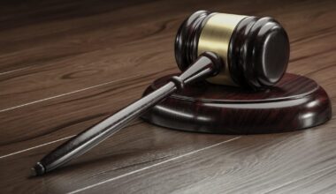 Ex-Michigan hockey doctor sentenced to 10 to 25 years for sexual misconduct