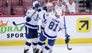 Tampa Bay Lightning center Jake Guentzel, center, celebrates his goal with defenseman Ryan McDonagh (27), and defenseman Erik Cernak (81) against the Florida Panthers during the third period in Game 3 of an NHL hockey Stanley Cup first-round playoff series, Saturday, April 26, 2025, in Sunrise, Fla. (AP Photo/Rhona Wise)