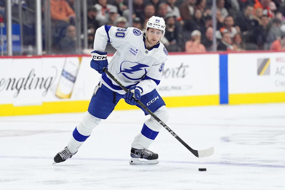 Mar 13, 2025; Philadelphia, Pennsylvania, USA; Tampa Bay Lightning defenseman J.J. Moser (90) controls the puck against the Philadelphia Flyers in the third period at Wells Fargo Center. Mandatory Credit: Kyle Ross-Imagn Images