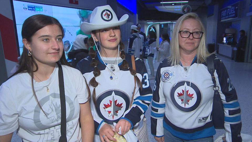 Winnipeg Jets fans Dayna Laviolette, right, and Kianna Ritchot, centre, said they were sad to see the team lose the second-round series against the Dallas Stars on Saturday, May 17. 