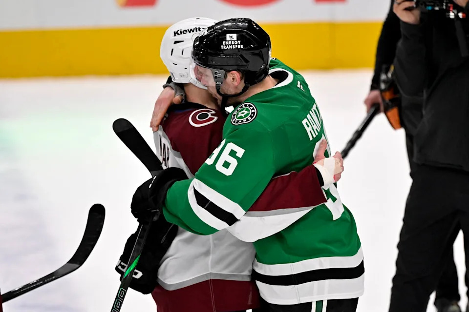 Colorado Avalanche defenseman Cale Makar (8) hugs Dallas Stars right wing Mikko Rantanen (96) after the Stars defeats the Avalanche in game seven of the first round of the 2025 Stanley Cup Playoffs at American Airlines Center. Mandatory Credit: Jerome Miron-Imagn Images