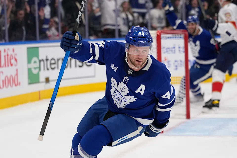 Toronto Maple Leafs defenseman Morgan Rielly (44) celebrates a goal against the Florida Panthers at Scotiabank Arena.John E&period; Sokolowski-Imagn Images