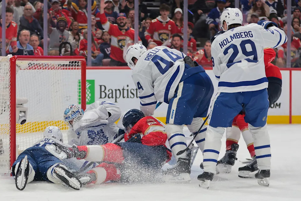 May 9, 2025; Sunrise, Florida, USA; Florida Panthers center Sam Reinhart (13) pushes the puck and scores against Toronto Maple Leafs goaltender Joseph Woll (60) during the second period in game three of the second round of the 2025 Stanley Cup Playoffs at Amerant Bank Arena. Mandatory Credit: Sam Navarro-Imagn Images