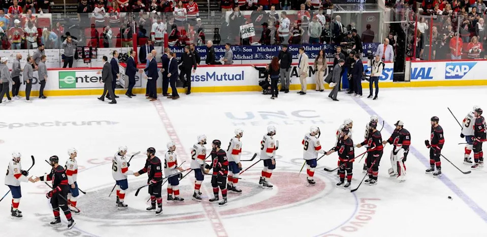 The Florida Panthers and the Carolina Hurricanes go through their handshake line after the Panthers clinched their Stanley Cup series with a 5-3 victory on Wednesday, May 28, 2025 at Lenovo Center in Raleigh, N.C. Robert Willett/rwillett@newsobserver.com