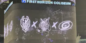 Gargoyles logo next to Chicago Wolves logo next to Carolina Hurricanes logo signifying affiliation