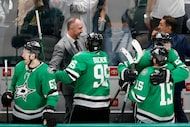 Dallas Stars head coach Peter DeBoer celebrates a last second goal with center Matt Duchene...