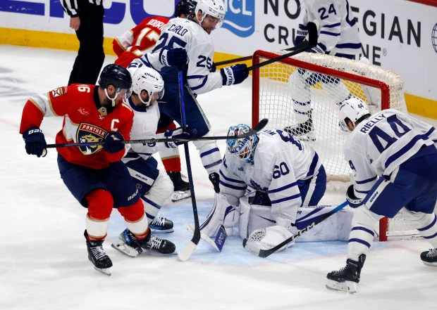 A shot by Florida Panthers center Aleksander Barkov (16) is...