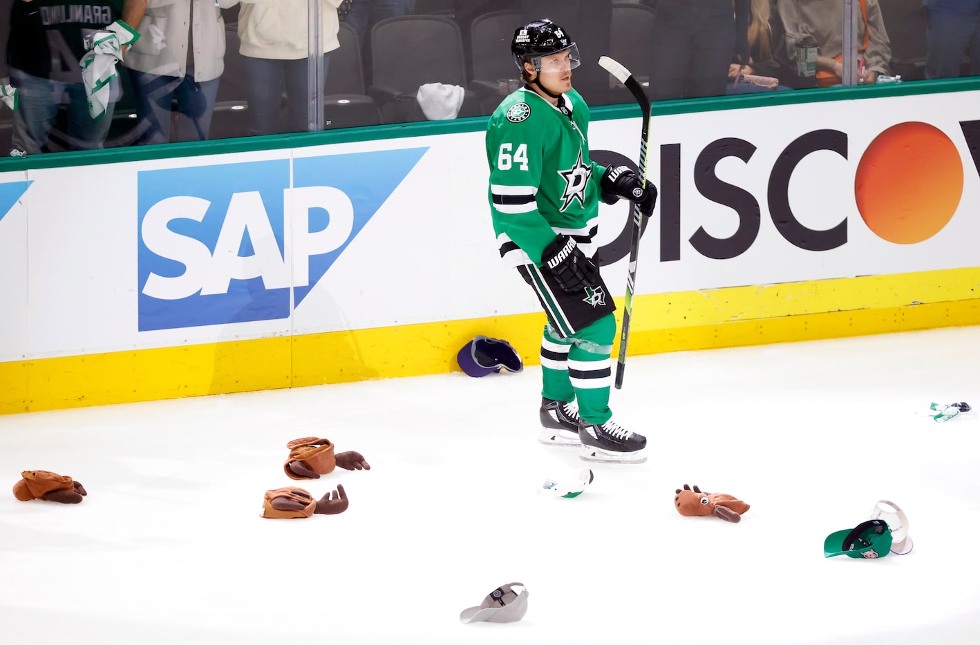 Dallas Stars center Mikael Granlund (64) skates through the hats after scoring a hat trick...