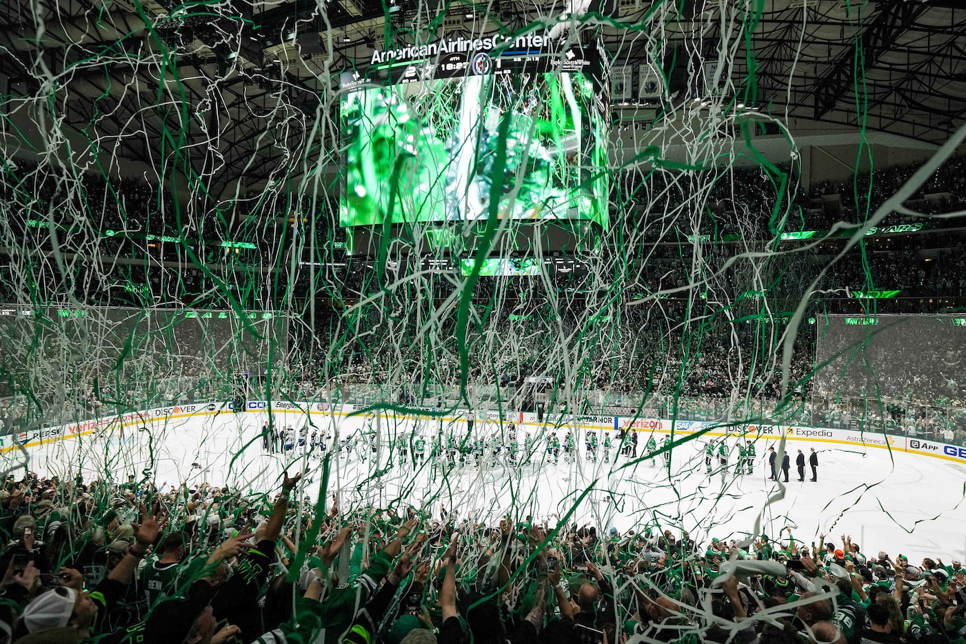 Confetti falls as the teams exchange handshakes after the Dallas Stars overtime victory in...