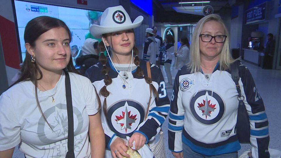 Winnipeg Jets fans Dayna Laviolette, right, and Kianna Ritchot, centre, said they were sad to see the team lose the second-round series against the Dallas Stars on Saturday, May 17. 